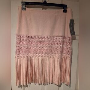 Bagatelle pink faux suede skirt with lace & tassels. Lined. L